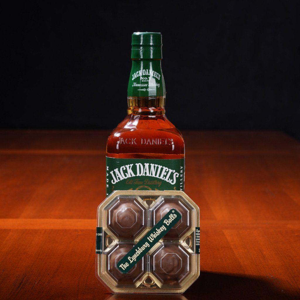 https://thewhiskeycave.com/cdn/shop/products/lynchburg-chocolate-whiskey-balls-made-with-jack-daniels-4-pack-402320_2000x.jpg?v=1697417292